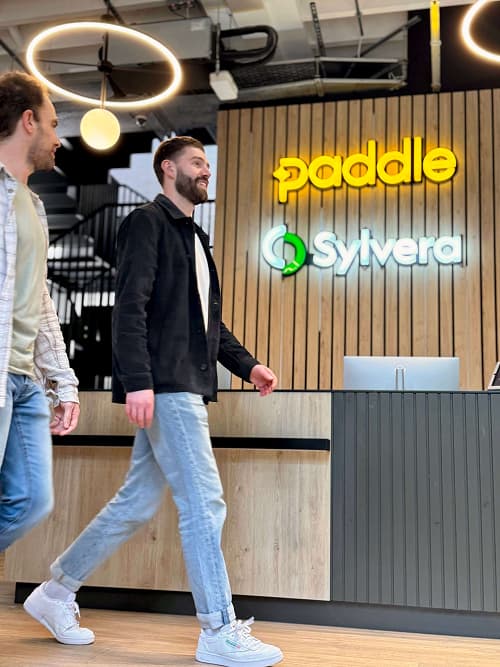 Dan walking in at the Paddle office